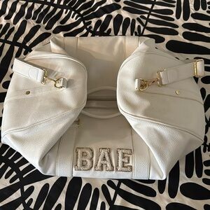 Stoney Clover Lane White Vegan Leather Duffle Bag
Patches sewn